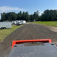 Freshly graded and graveled area viewed from heavy machinery